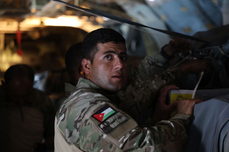 IN FLIGHT, GAZA - JULY 31: A Jordanian C-130 military aircraft performs an air drop of aid and supplies on July 31, 2025 over the Gaza Strip. The air drop was a joint effort with the United Arab Emirates Air Force and delivered twenty tons of food, baby milk, and other basic items. Jordan and other regional governments have recently resumed air drops of aid as the humanitarian crisis, including lack of access to food, has worsened. (Photo by Salah Malkawi/Getty Images)