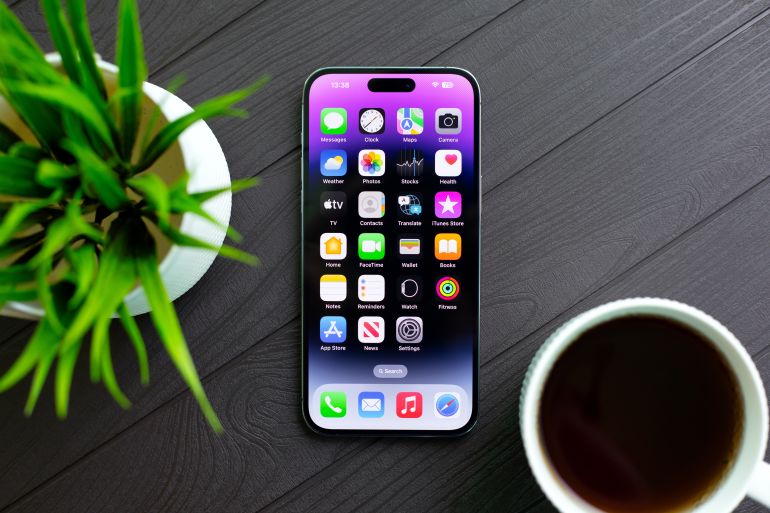 Alanya, Turkey - April 28, 2024: Phone Apple iPhone 15 Pro Max with home screen IOS 17 on the screen.