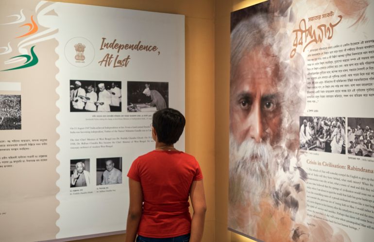 Alipore Jail Museum, Kolkata, 01-27-2023: a kid looking at gallery of Rabindranath Tagore (Asia's 1st Nobel winner) and Jawaharlal Nehru, taking oath as 1st prime minister of India after Independence
